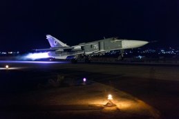 Su-24 taking off at night, loaded with OFAB-250 bombs